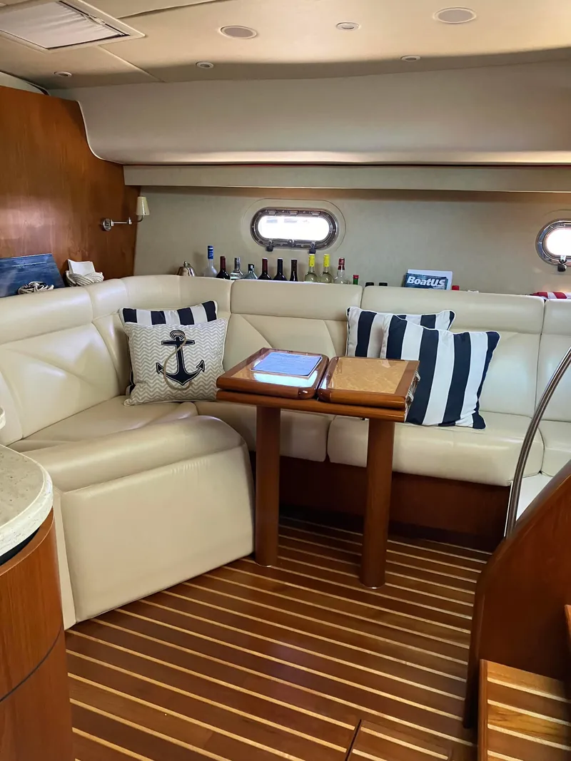 Slide: The Image of Luxurious 2009 Tiara Yachts 4300 Sovran interior with elegant seating and nautical decor. - 7