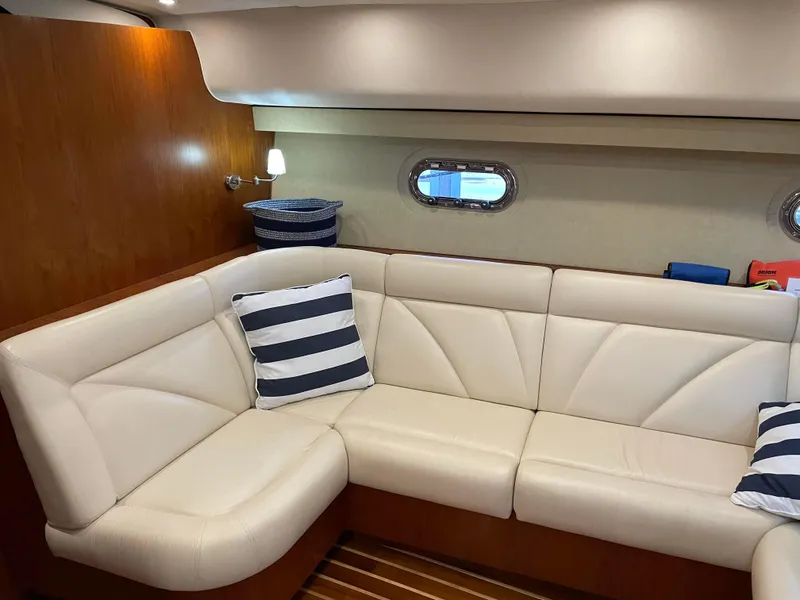 Slide: The Image of Luxurious interior of 2009 Tiara Yachts 4300 Sovran with cream leather seating. - 9
