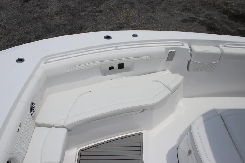 Slide: The Image of 2026 Tidewater 272 LXF boat interior with white seating and modern design. - 10