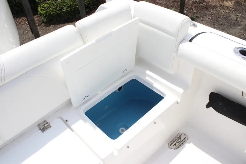 Slide: The Image of 2026 Tidewater 272 LXF boat interior with open storage compartment. - 26