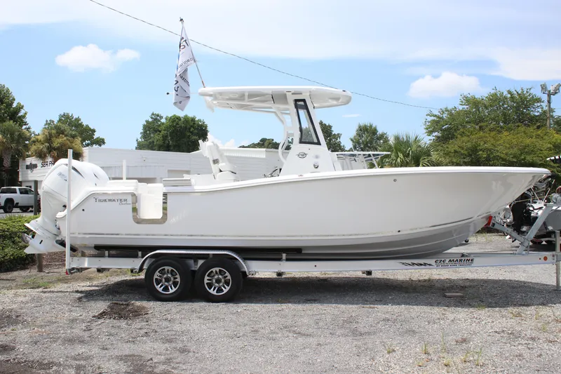 Slide: The Image of 2026 Tidewater 272 LXF boat on trailer, displayed outdoors under clear sky. - 4
