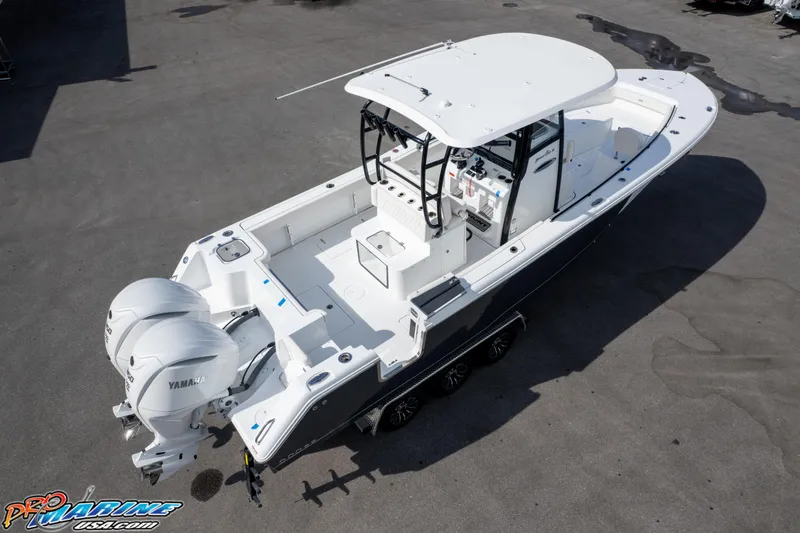 Slide: The Image of 2026 Sea Hunt Gamefish 30 boat with dual Yamaha engines, viewed from above. - 11