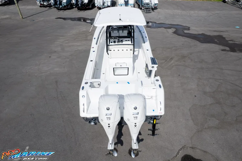 Slide: The Image of 2026 Sea Hunt Gamefish 30 boat with dual 350 V6 engines, viewed from above. - 12