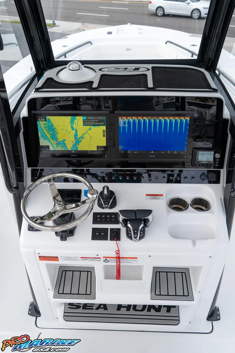 Slide: The Image of 2026 Sea Hunt Gamefish 30 dashboard with advanced navigation and control systems. - 21