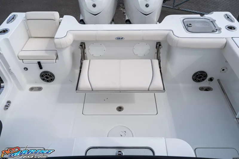 Slide: The Image of 2026 Sea Hunt Gamefish 30 boat interior with seating and storage features. - 28