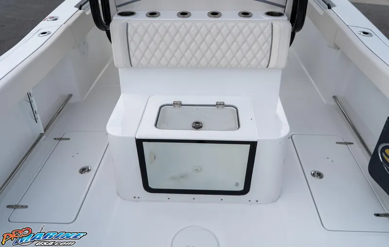 Slide: The Image of 2026 Sea Hunt Gamefish 30 boat interior with seating and storage compartments. - 29