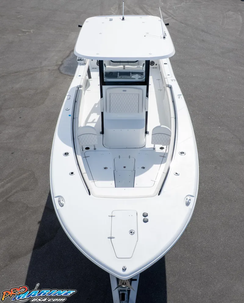 Slide: The Image of 2026 Sea Hunt Gamefish 30 boat, aerial view, sleek design, spacious deck, white finish. - 7