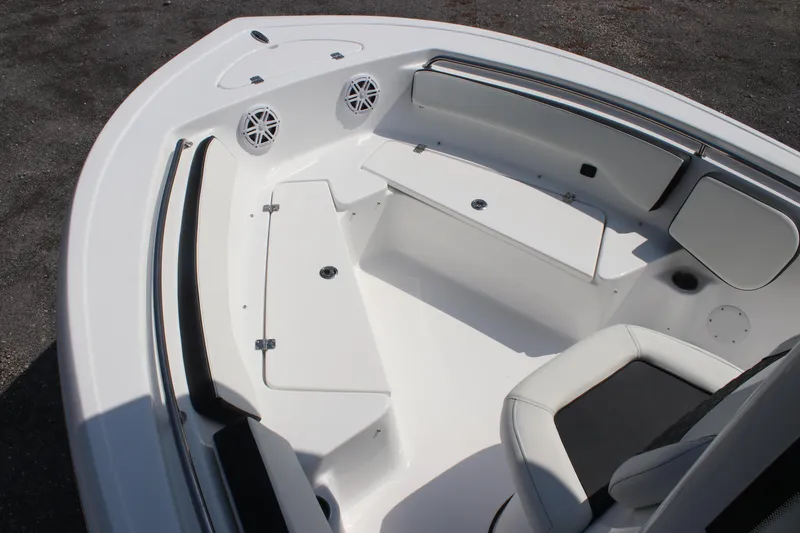 Slide: The Image of 2026 Tidewater 198 CC Adventure boat interior with seating and storage compartments. - 11