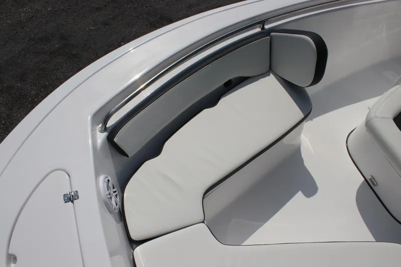 Slide: The Image of 2026 Tidewater 198 CC Adventure boat with sleek white seating and stainless steel rail. - 19