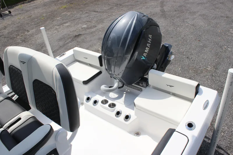 Slide: The Image of 2026 Tidewater 198 CC Adventure boat with Yamaha outboard motor, rear seating view. - 29