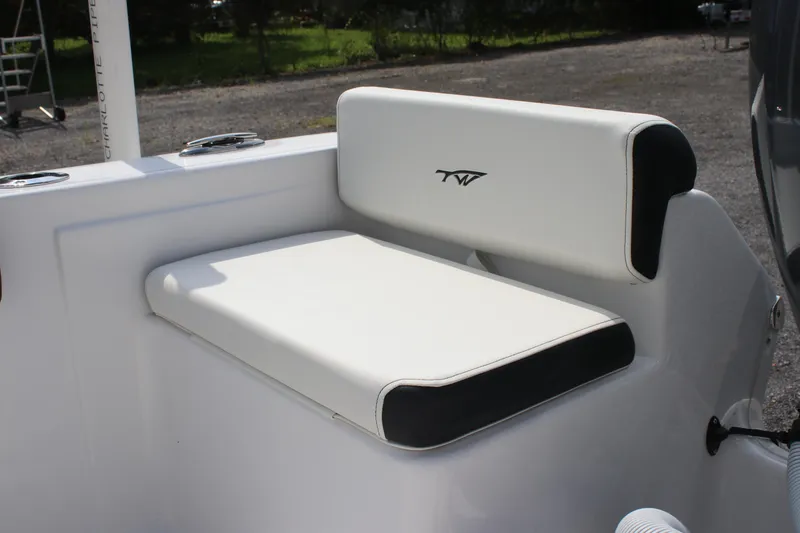 Slide: The Image of 2026 Tidewater 198 CC Adventure boat seat with white and black upholstery. - 30