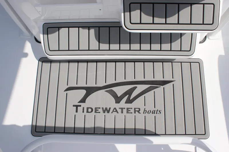 Slide: The Image of Tidewater 198 CC Adventure 2026 boat deck with logo and non-slip surface. - 33