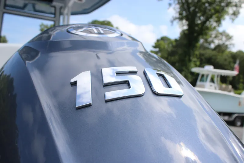 Slide: The Image of Close-up of 150 horsepower engine on 2026 Tidewater 198 CC Adventure boat. - 37