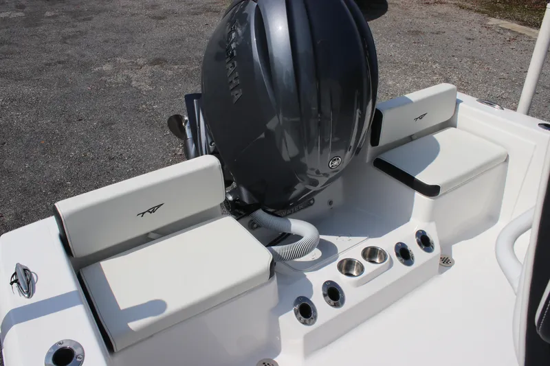 Slide: The Image of 2026 Tidewater 198 CC Adventure boat with Yamaha engine and seating area. - 9