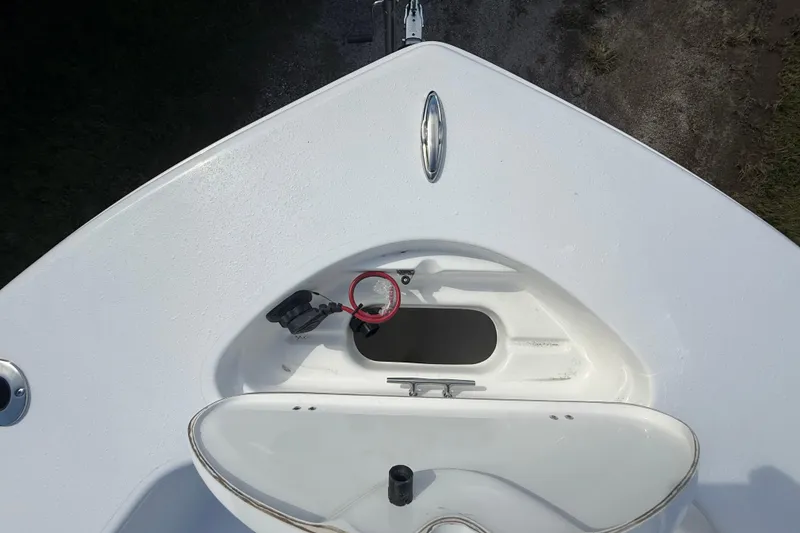 Slide: The Image of Bow view of 2026 Tidewater 180 CC Adventure boat, featuring anchor storage. - 31