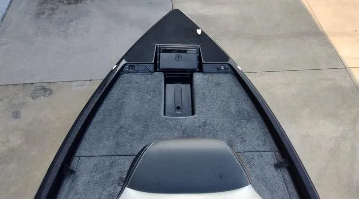 Slide: The Image of Bow of 2026 Phoenix 721zxl boat with carpeted deck and storage compartments. - 4