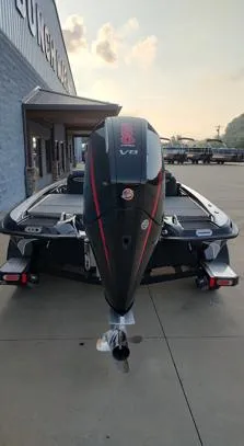 Slide: The Image of 2026 Phoenix 721zxl boat with powerful V8 engine, parked outdoors. - 9