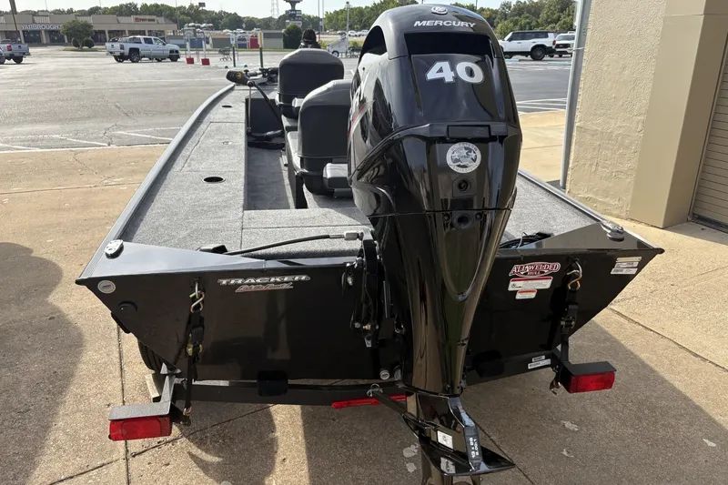 Slide: The Image of 2025 Tracker Panfish 17 boat with Mercury 40 engine in parking lot. - 4