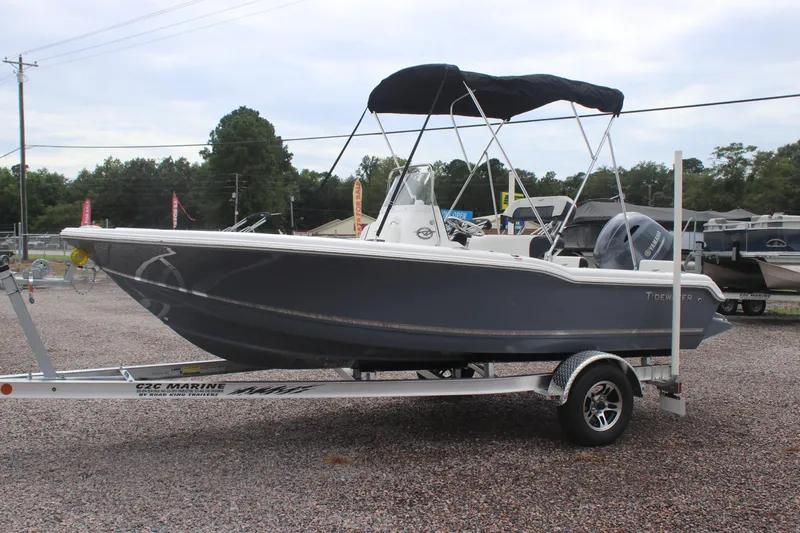 The Image of 2026 Tidewater 180 CC Adventure boat on trailer, parked outdoors. - 0