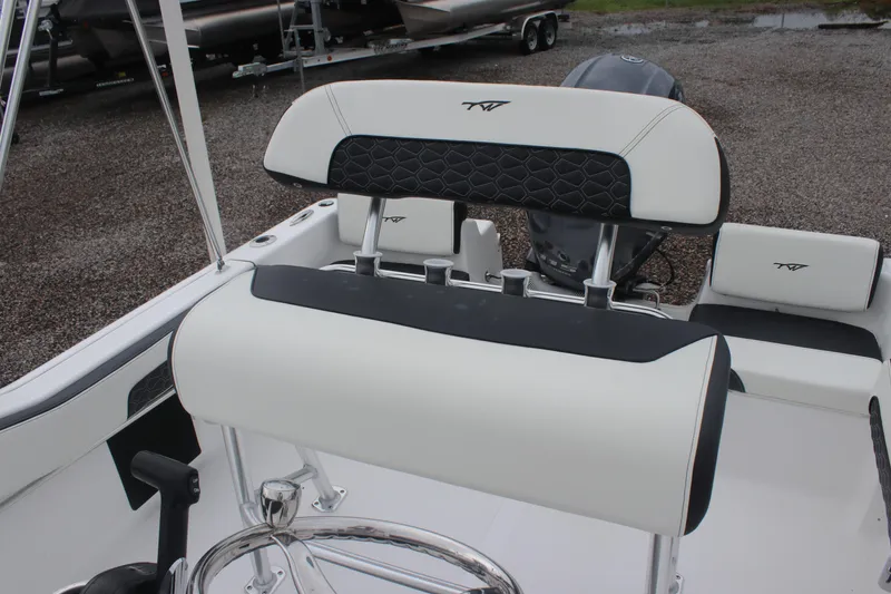 Slide: The Image of 2026 Tidewater 180 CC Adventure boat interior with sleek seating and modern design. - 16