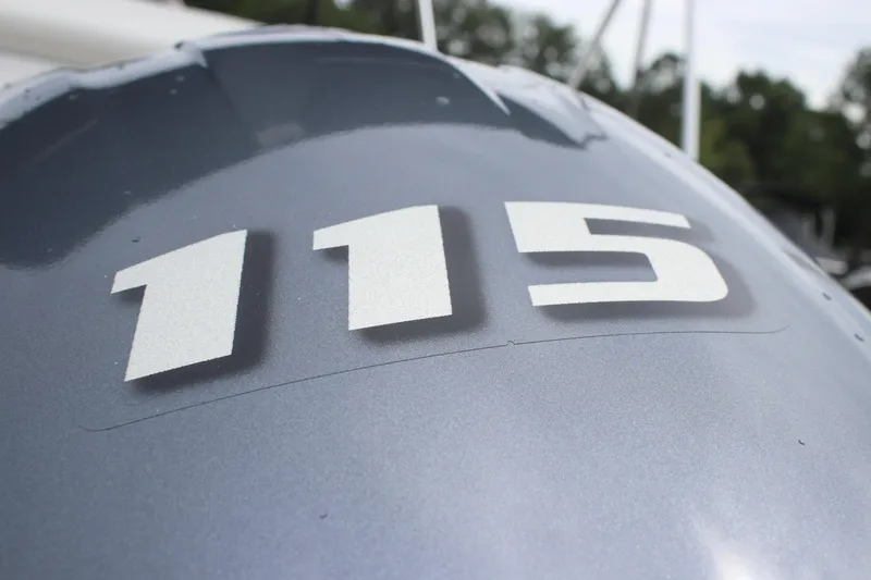 Slide: The Image of Close-up of 115 decal on 2026 Tidewater 180 CC Adventure boat. - 22