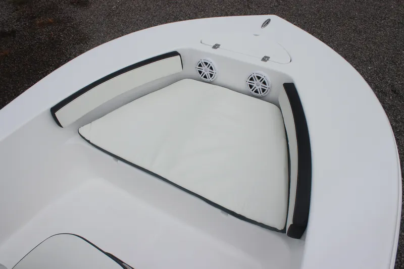 Slide: The Image of 2026 Tidewater 180 CC Adventure boat bow with cushioned seating and speakers. - 8
