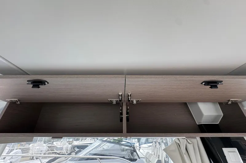 Slide: The Image of Interior of 2026 Jeanneau NC 1095 boat with cozy bed and modern design. - 14