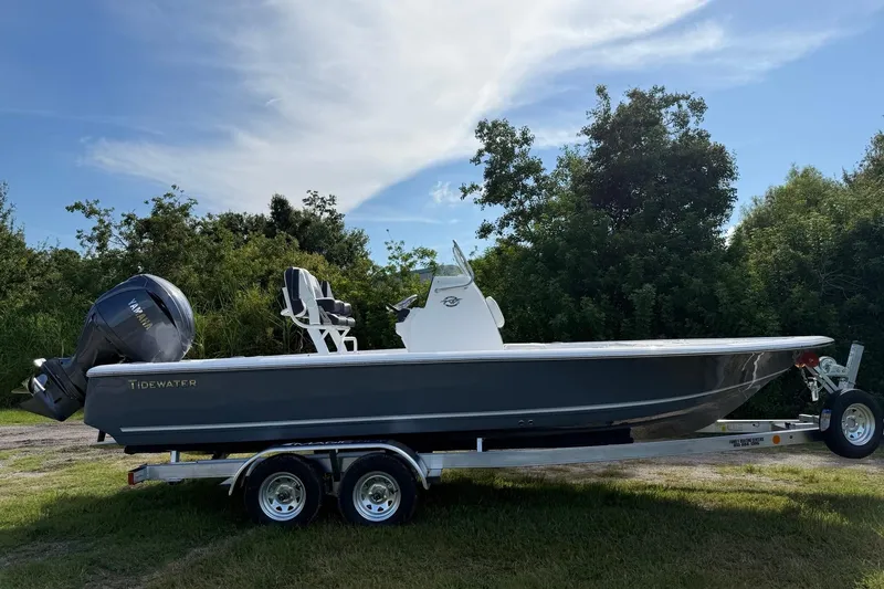 Slide: The Image of 2026 Tidewater 2110 Bay Max boat on trailer, parked outdoors. - 8