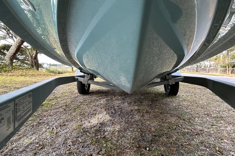 Slide: The Image of 2023 Boston Whaler 160 Super Sport boat on trailer, viewed from below. - 20
