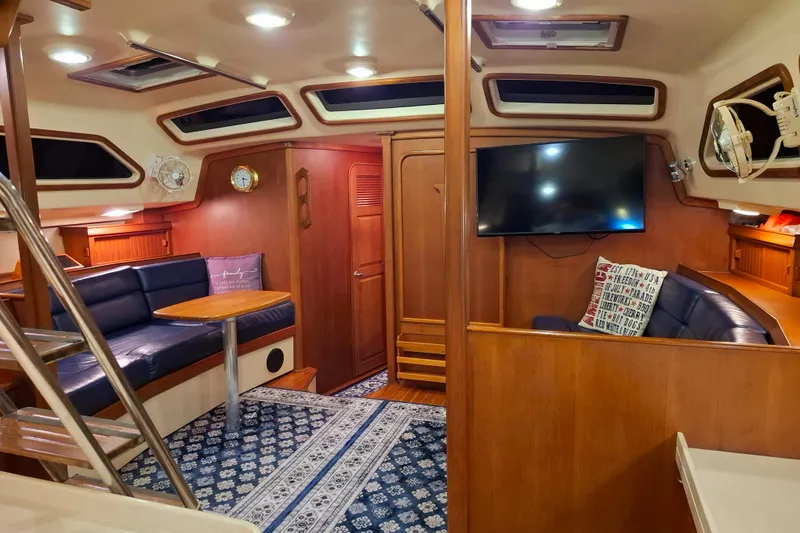 Slide: The Image of Luxurious interior of 2003 Island Packet 485 yacht with cozy seating and modern amenities. - 14