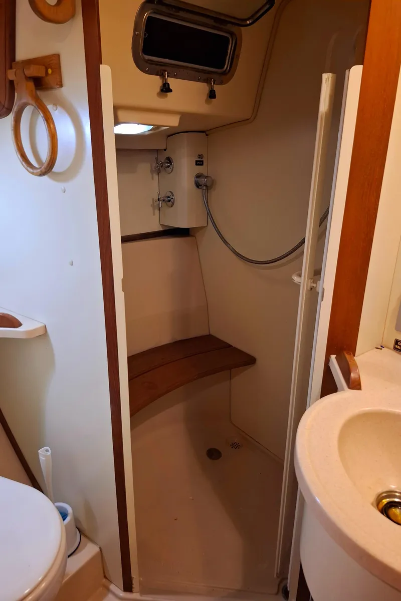 Slide: The Image of Bathroom interior of 2003 Island Packet 485 yacht with shower and sink. - 27