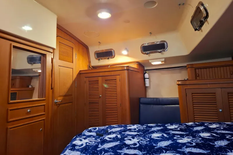 Slide: The Image of Luxurious cabin interior of 2003 Island Packet 485 yacht with wooden furnishings. - 29