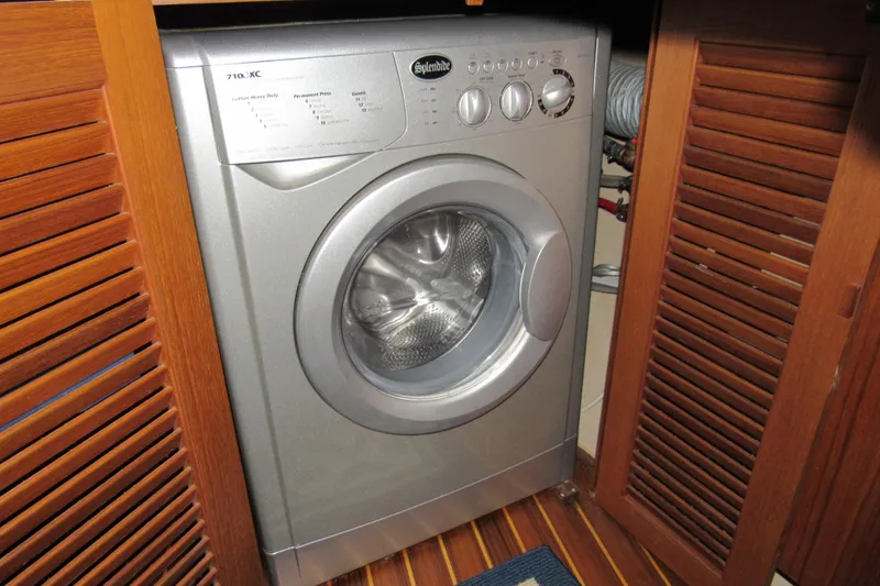 Slide: The Image of Washing machine in wooden cabinet on Island Packet 485 yacht, 2003 model. - 38