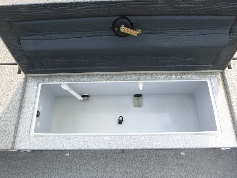 Slide: The Image of Open storage compartment in 2025 KingFisher 2125 Arrow Sport boat. - 12
