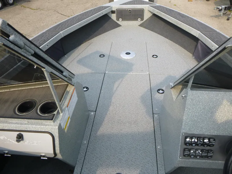 Slide: The Image of 2025 KingFisher 2125 Arrow Sport boat interior with open windshield and control panel. - 15
