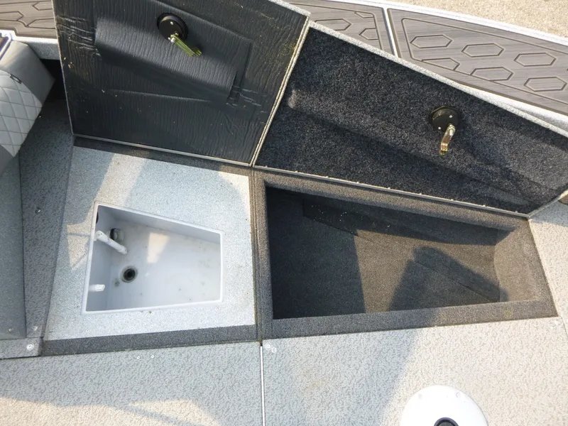 Slide: The Image of Interior compartments of 2025 KingFisher 2125 Arrow Sport boat, featuring storage and utility spaces. - 17