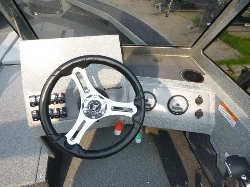 Slide: The Image of Steering wheel and dashboard of 2025 KingFisher 2125 Arrow Sport boat. - 8