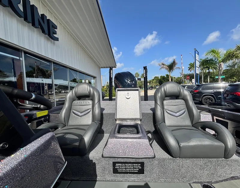 Slide: The Image of Open storage compartment on 2025 Falcon Boats 21 Predator deck. - 15