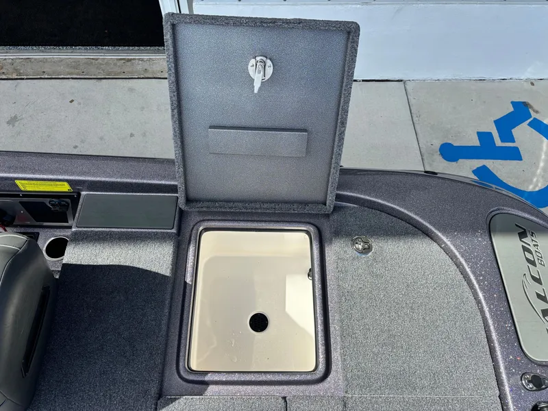 Slide: The Image of 2025 Falcon Boats 21 Predator interior with dual seats and modern dashboard. - 16