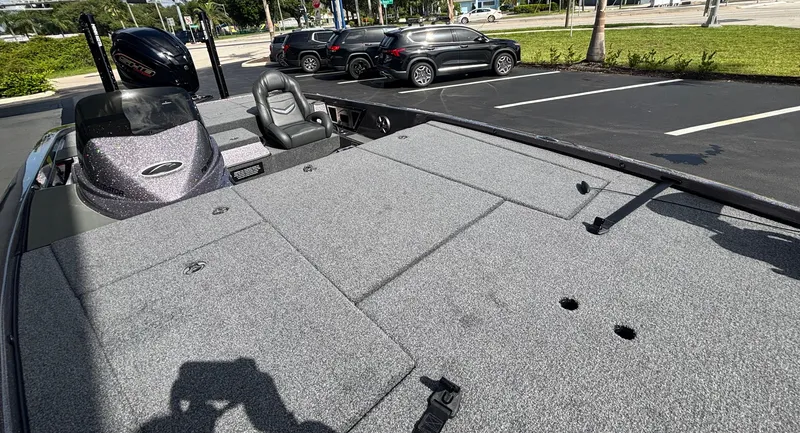 Slide: The Image of 2025 Falcon Boats 21 Predator interior with dual seats and storage compartments. - 18