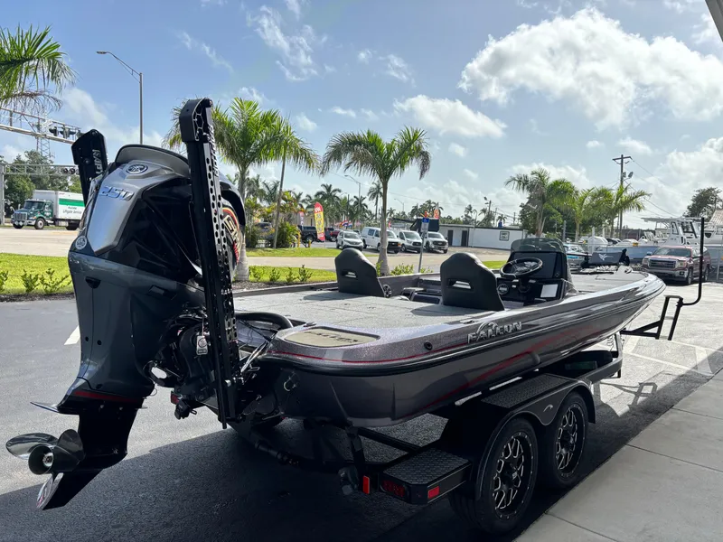 Slide: The Image of 2025 Falcon Boats 21 Predator, sleek design with metallic finish and spacious deck. - 7