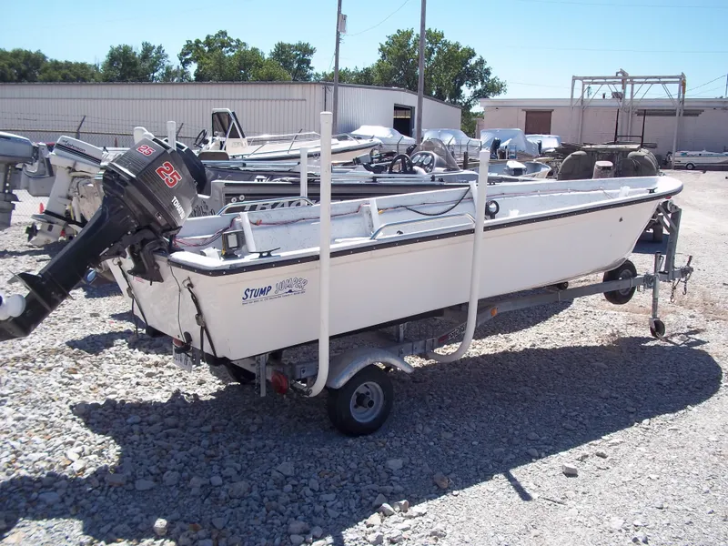 Slide: The Image of 1996 Tracker Pro Angler V 16 boat on trailer in outdoor storage area. - 22