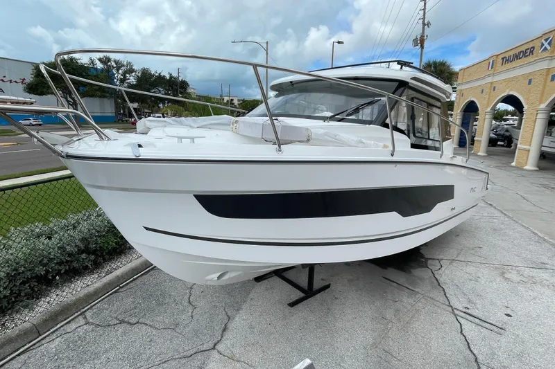 Slide: The Image of Interior of 2026 Jeanneau NC 795 Weekender, featuring cozy seating and modern design. - 11