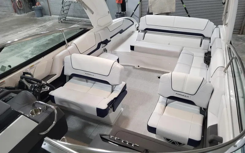 Slide: The Image of 2026 Formula 290 Bowrider interior with luxurious white seating and modern design. - 18