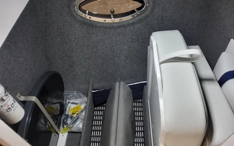 Slide: The Image of Interior storage of 2026 Formula 290 Bowrider boat with cushions and equipment. - 20