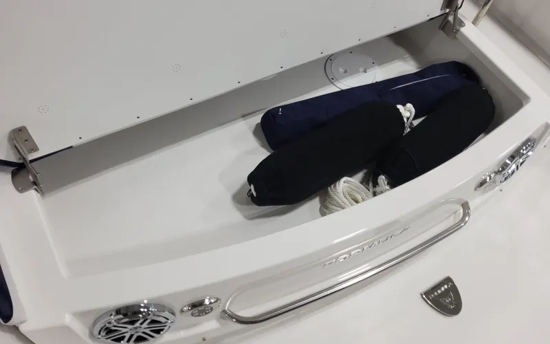 Slide: The Image of 2026 Formula 290 Bowrider storage compartment with ropes and fenders. - 22