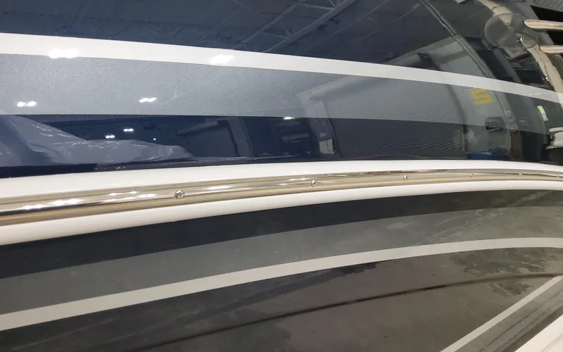 Slide: The Image of 2026 Formula 290 Bowrider boat with sleek, modern design and metallic accents. - 3