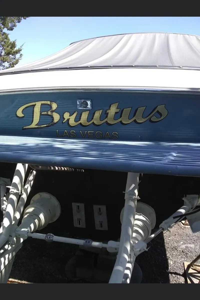 Slide: The Image of 1988 Magnum 40 Sport boat named "Brutus" with Las Vegas branding on the stern. - 20