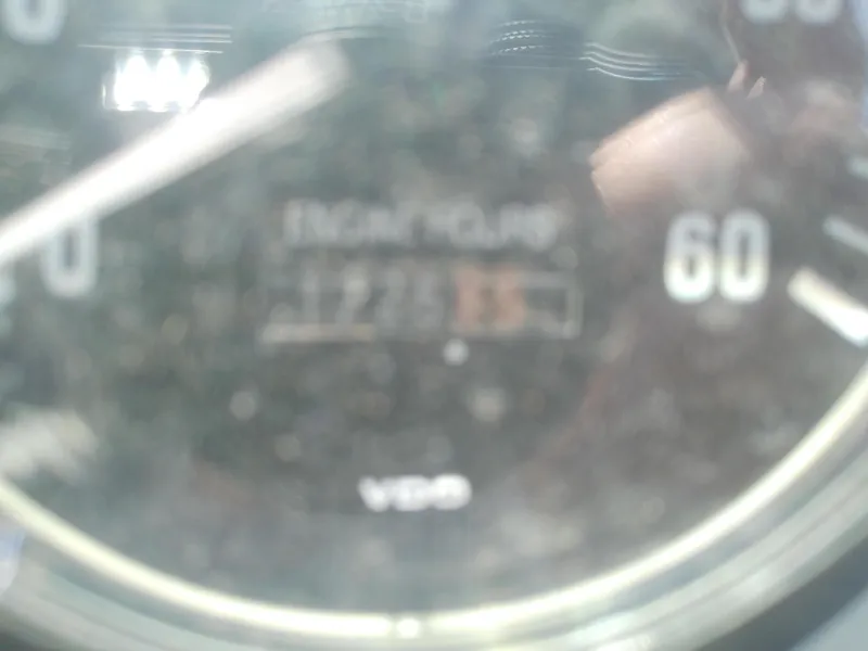 Slide: The Image of Blurry engine hour meter on a 2000 Tiara Yachts 3100 Open. - 35