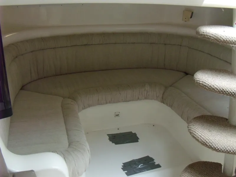 Slide: The Image of Interior seating area of a 1996 Silverton 310 Express boat. - 14